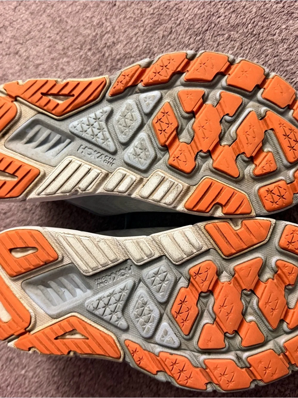 Hoka light gray and yellow running shoes